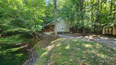 329 Kinzer Road, Home with 3 bedrooms, 2 bathrooms and null parking in Bainbridge OH | Image 2