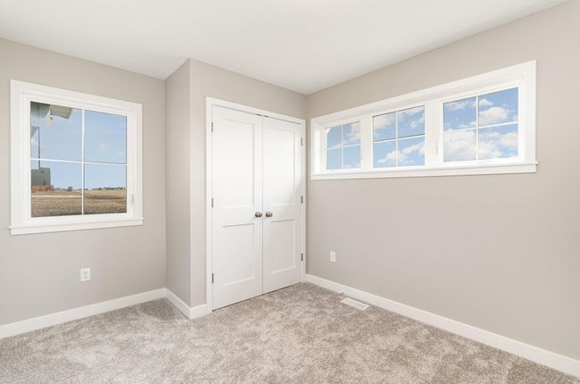 Beautiful Enameled Trim Work throughout and ample natural lighting, Casement Windows with Grilles. | Image 15