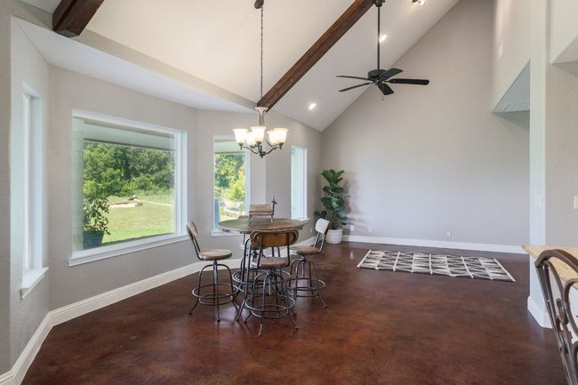 Breakfast area plus additional living area. | Image 9