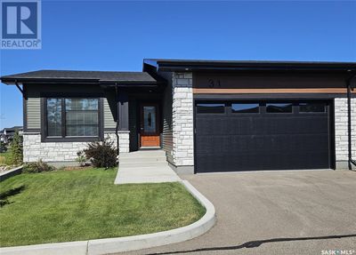 310 Evergreen Blvd, Townhouse with 4 bedrooms, 3 bathrooms and null parking in Saskatoon SK | Image 1