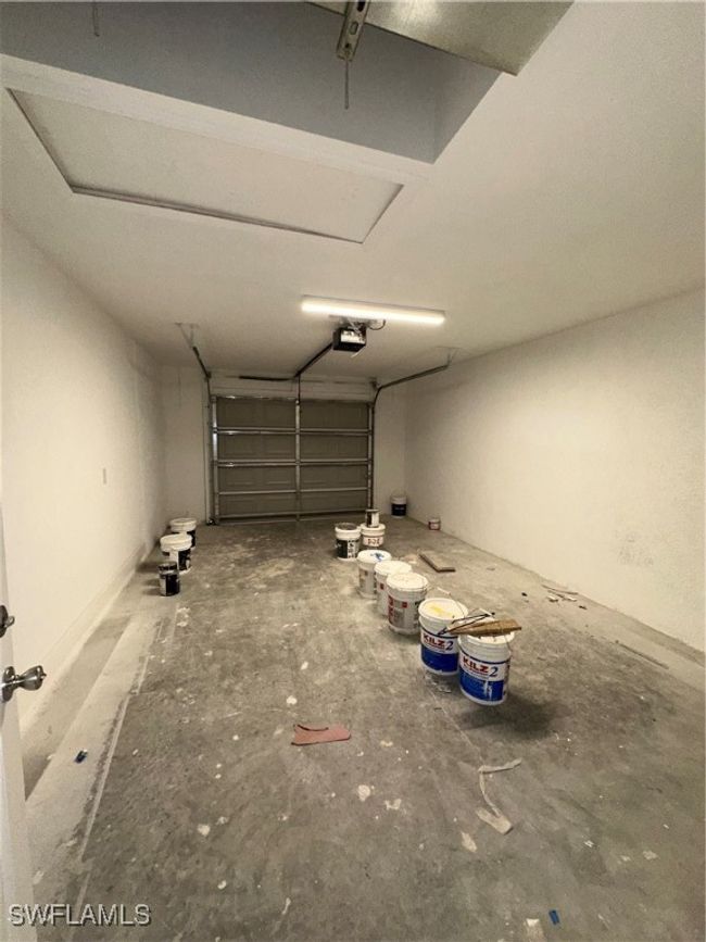 Garage featuring a garage door opener | Image 19