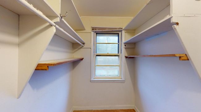 View of spacious closet | Image 17