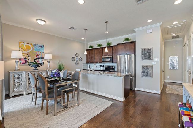 2nd Floor Dining area with baseboards, dark wood finished floors, and crown molding | Image 10