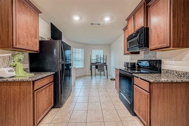 9915 Garnet Grove Dr, House other with 4 bedrooms, 2 bathrooms and 2 parking in Iowa Colony TX | Image 13