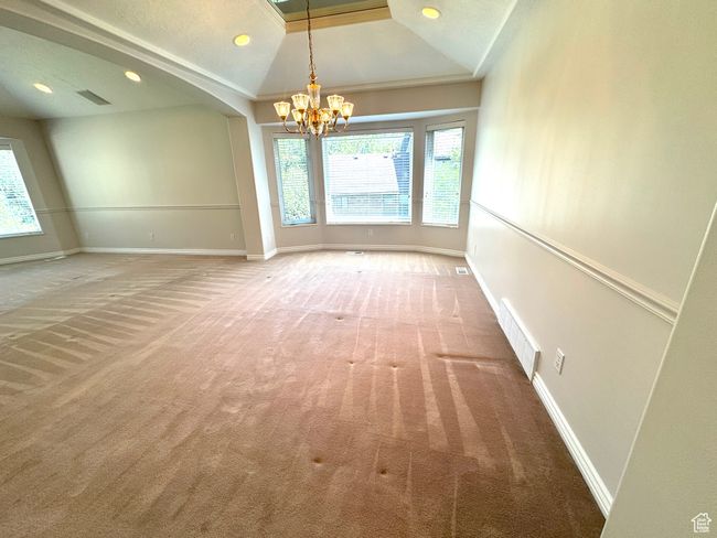 Formal dining area with bay window. | Image 5