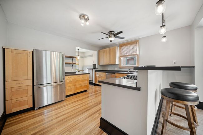 Large kitchen with breakfast bar and nook | Image 10