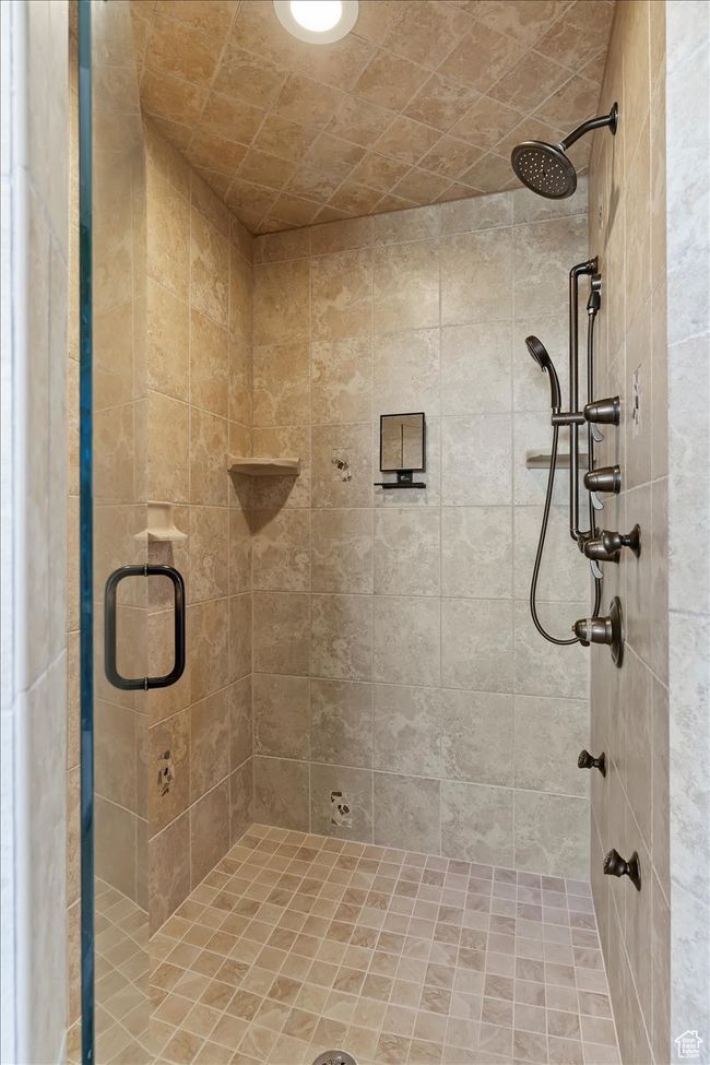 Bathroom featuring a stall shower | Image 37