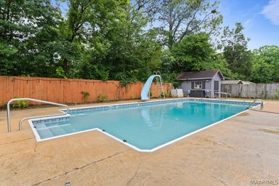 Enjoy the large chlorine pool right in the backyard! | Image 3