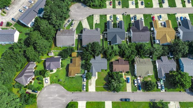 Aerial view of property and surrounding area featuring nearby suburban area | Image 6