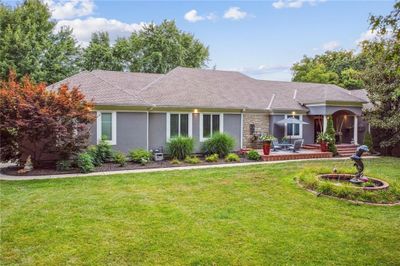 Single story home featuring a front lawn | Image 2