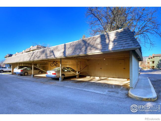 Dedicated carport parking with additional storage area | Image 23