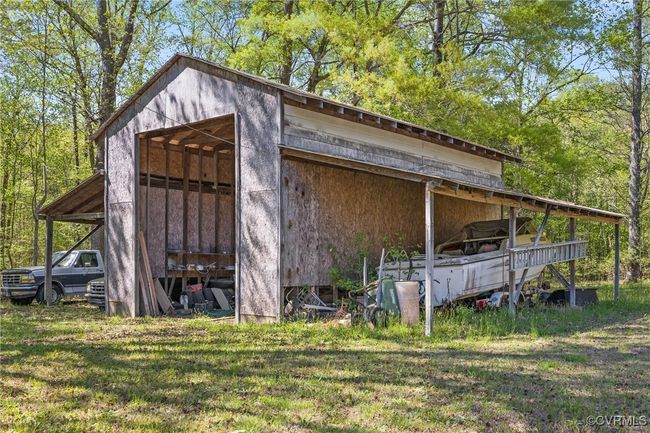 View of pole building with a lawn | Image 29