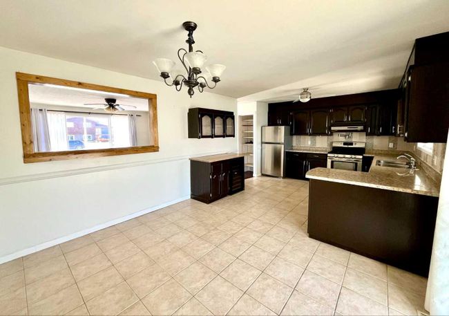 9119 95 Avenue, Home with 5 bedrooms, 2 bathrooms and 4 parking in Lac La Biche AB | Image 9