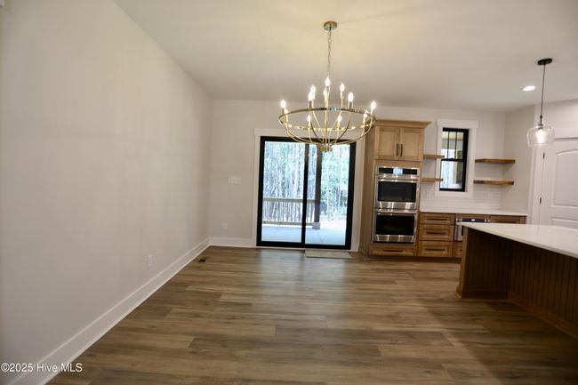 Dining Room adjoins kitchen w/extra seating at bar | Image 14