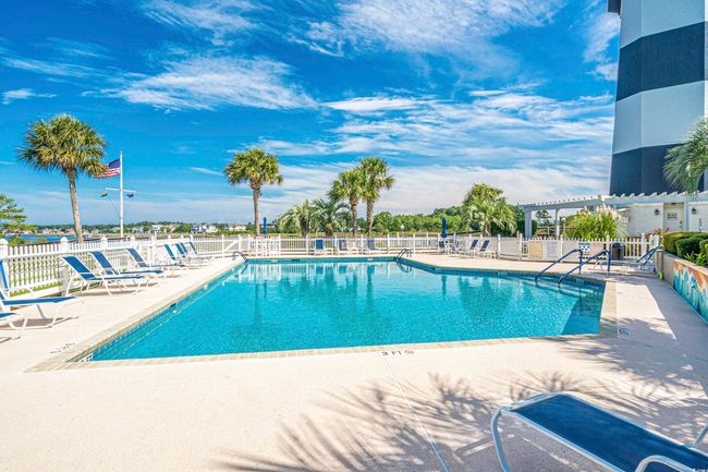 Community pool featuring a patio | Image 34