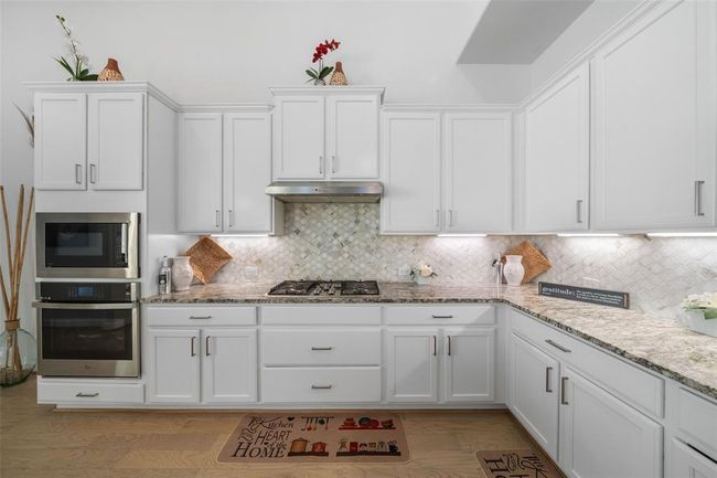 9207 Secretariat Ln, House other with 4 bedrooms, 4 bathrooms and 3 parking in Mont Belvieu TX | Image 6