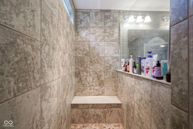bathroom with a walk in shower | Image 22