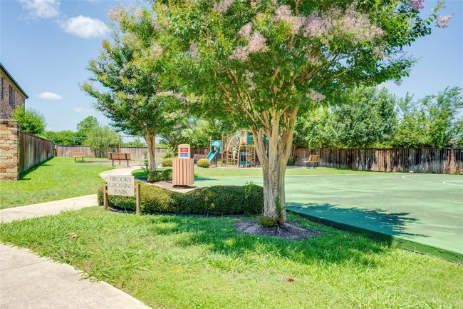 View of yard featuring a playground | Image 29