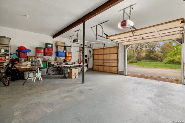 2-car Attached Garage opens to North Yard | Image 23