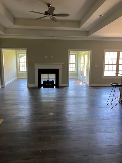 Great room with see thru fire place looking into sun room | Image 2