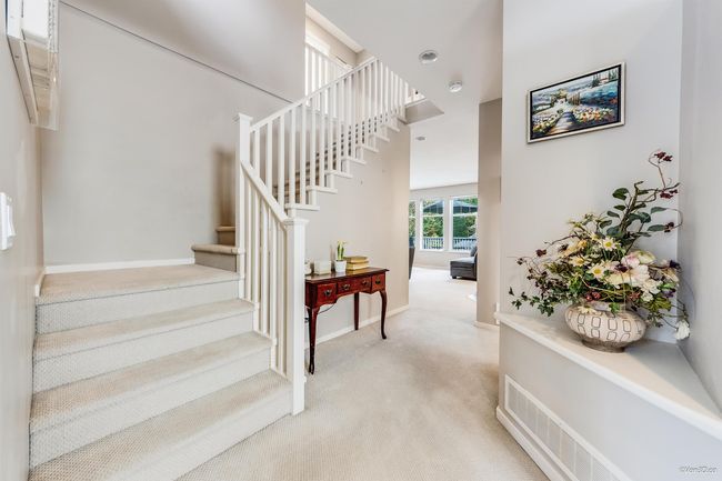 Stairs featuring baseboards and carpet floors | Image 11