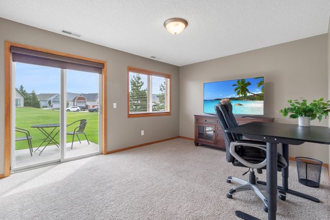 Family room with walk out patio | Image 16