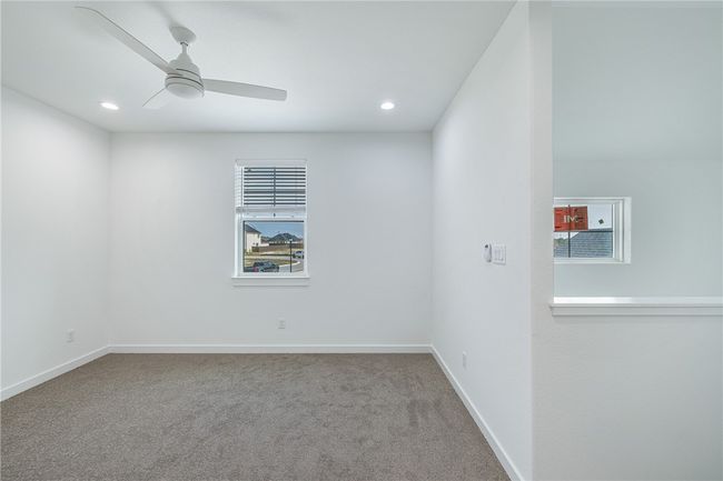 Carpeted empty room with ceiling fan | Image 30
