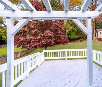 Charming Pergola frames view of stunning Red Maple. | Image 2