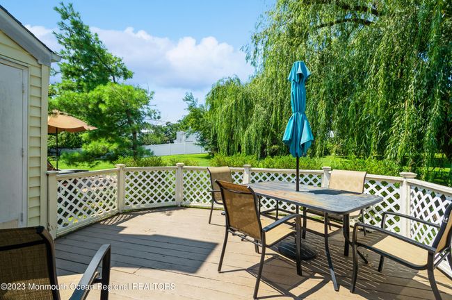 Spacious Outdoor Deck with Storage | Image 16