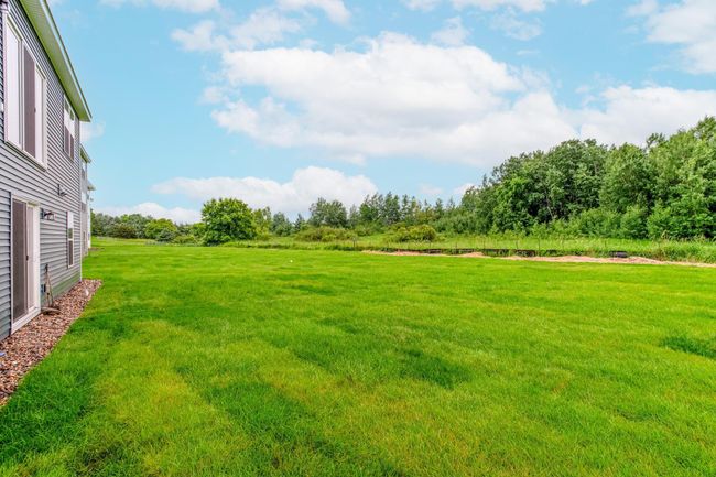 Enjoy expansive green space and a scenic backdrop, all while being ideally situated in a quiet, welcoming community. | Image 40