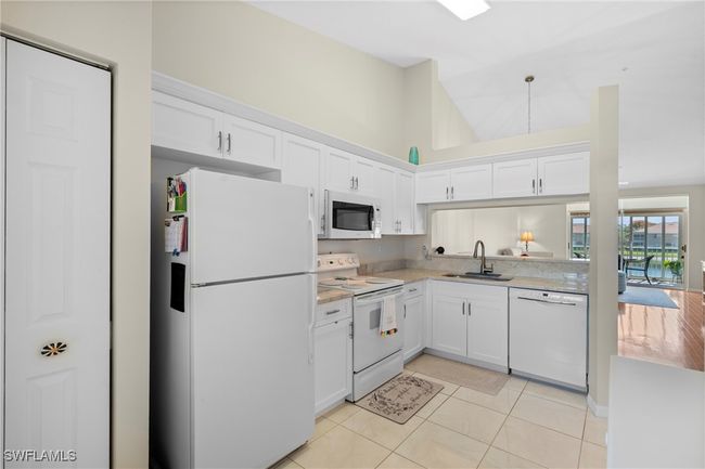 Kitchen featuring new quartz countertops | Image 8