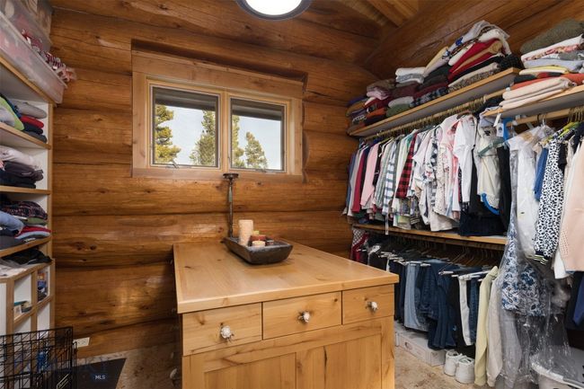 Primary bedroom walk-in closet | Image 24