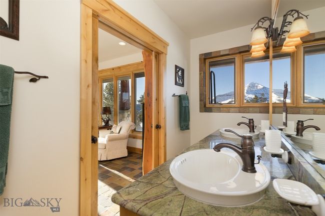 Entry level Bedroom 2 suite bathroom with mountain view. | Image 58