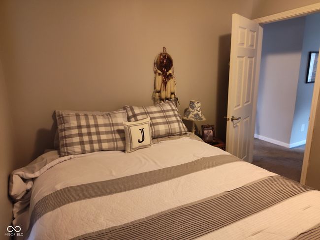 bedroom with carpet | Image 12