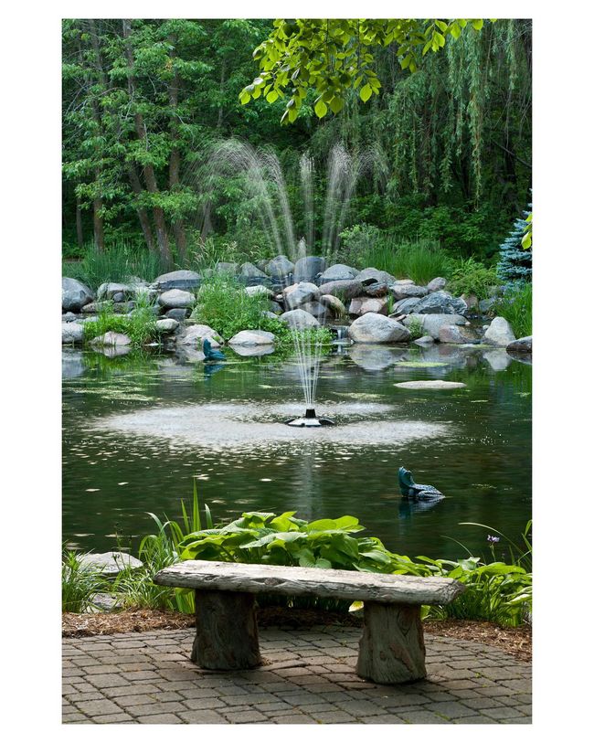 Sit on the bench and enjoy the peaceful sounds of the water feature | Image 12