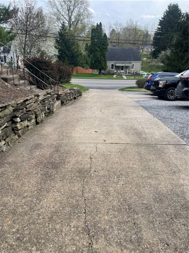 diveway plus extra gravel parking spaces | Image 40