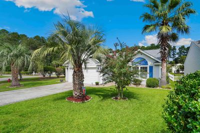 View of front facade with a front yard | Image 2