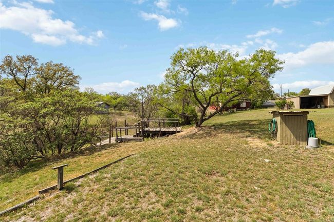 View of yard with an outdoor structure | Image 20