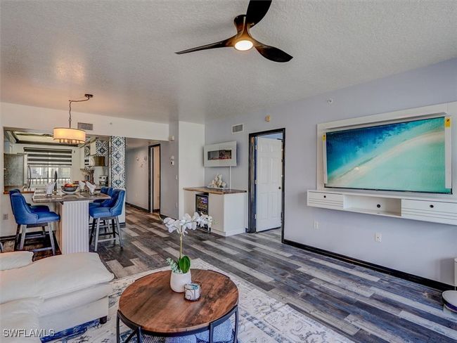 VIEW FROM LIVING AREA SHOWING ENTRANCE TO OWNER'S SUITE | Image 6