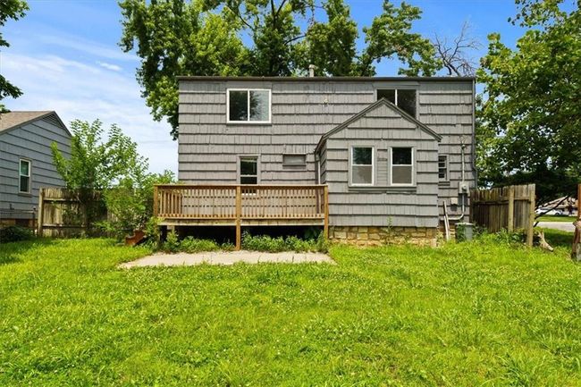Back of house featuring a wooden deck | Image 27