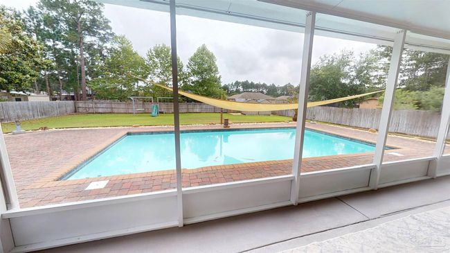 7445 Brevard St, House other with 4 bedrooms, 3 bathrooms and 6 parking in Navarre FL | Image 32