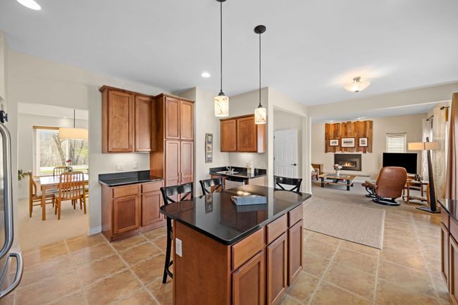 Open view from kitchen to dining and great room | Image 30