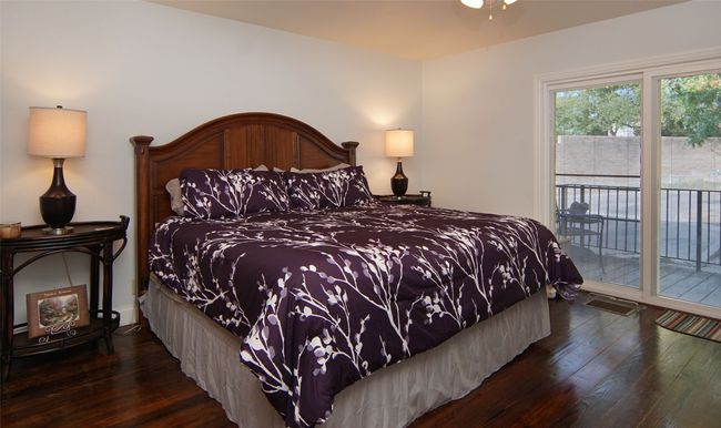 Third bedroom with private patio access. | Image 22