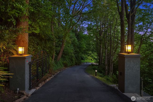 Elevated feeling of privacy upon entering the gates, perfect for frequent travelers. The property is located in the Hidden Valley among other sizable estates. | Image 4