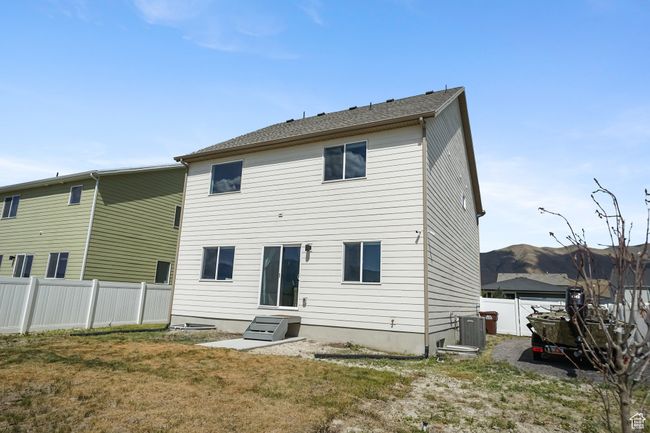 Back of house with cooling unit | Image 6