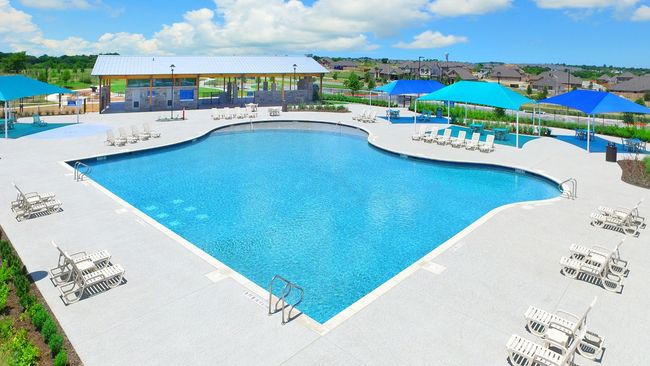 Pool with a patio and fence | Image 12