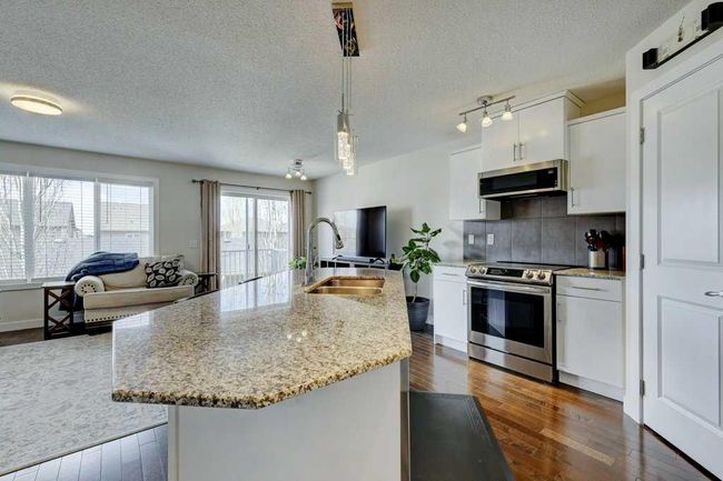 2735 Kings Heights Gate Se, Home with 4 bedrooms, 3 bathrooms and 2 parking in Airdrie AB | Image 7