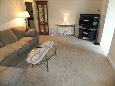 View of carpeted living room | Image 2