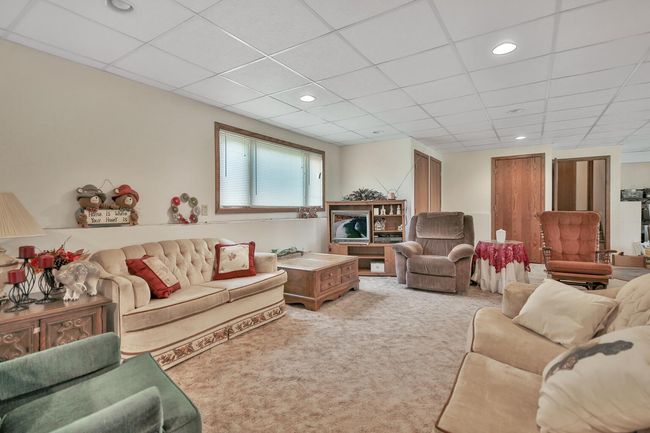 Spacious family room in lower level. | Image 24