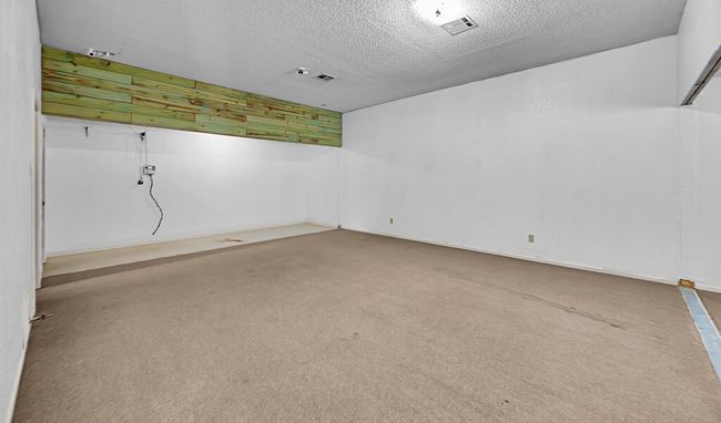 Unfurnished room featuring a textured ceiling and carpet​​‌​​​​‌​​‌‌​‌‌​​​‌‌​​‌‌​‌​​​​​‌ floors | Image 7